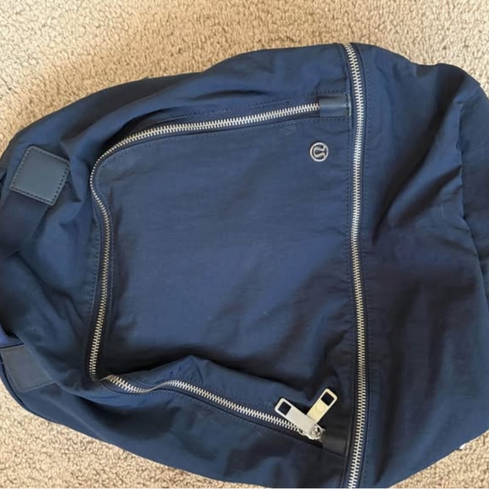 Navy Blue Backpack with Silver Zipper